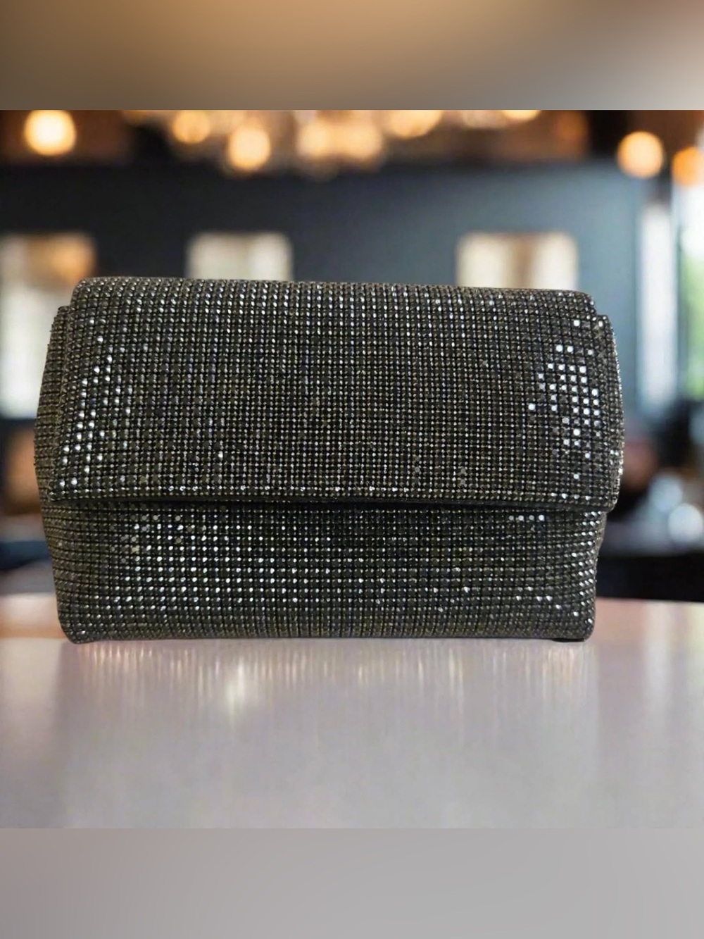 Sondra Robert’s Crystal-Embellished Black Evening Clutch.